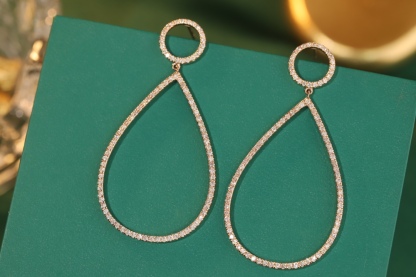 18k gold earrings set with a 1.20ct natural diamond