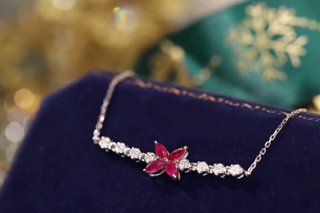 18k Gold Bracelet, Ruby Bracelet with a 0.40ct oval-shaped ruby and a 0.15ct natural diamond