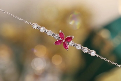 18k Gold Bracelet, Ruby Bracelet with a 0.40ct oval-shaped ruby and a 0.15ct natural diamond