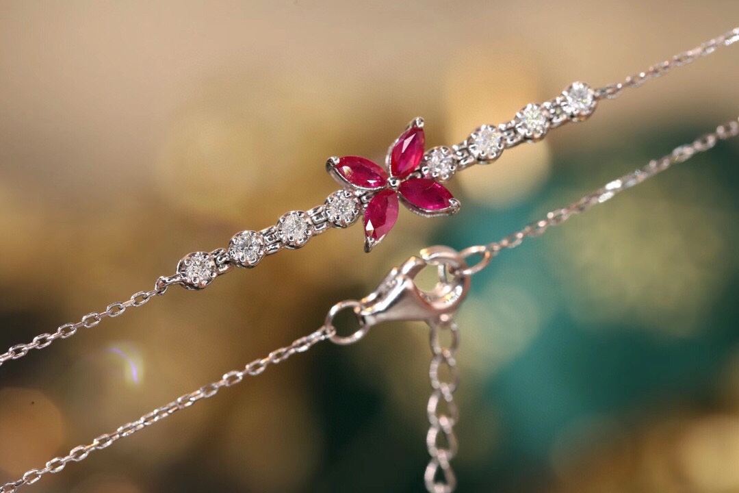 18k Gold Bracelet, Ruby Bracelet with a 0.40ct oval-shaped ruby and a 0.15ct natural diamond