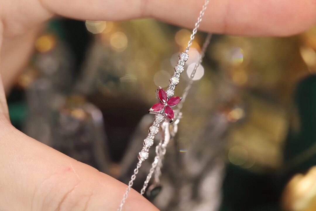 18k Gold Bracelet, Ruby Bracelet with a 0.40ct oval-shaped ruby and a 0.15ct natural diamond