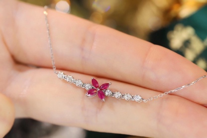 18k Gold Bracelet, Ruby Bracelet with a 0.40ct oval-shaped ruby and a 0.15ct natural diamond