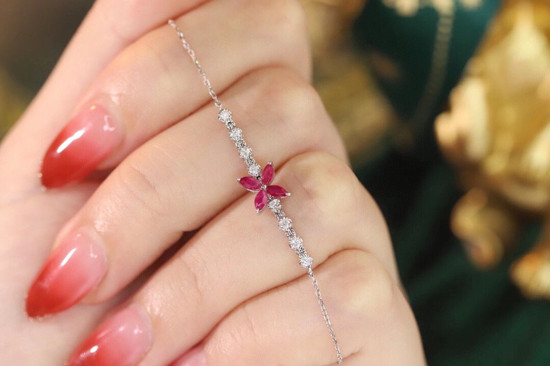 18k Gold Bracelet, Ruby Bracelet with a 0.40ct oval-shaped ruby and a 0.15ct natural diamond