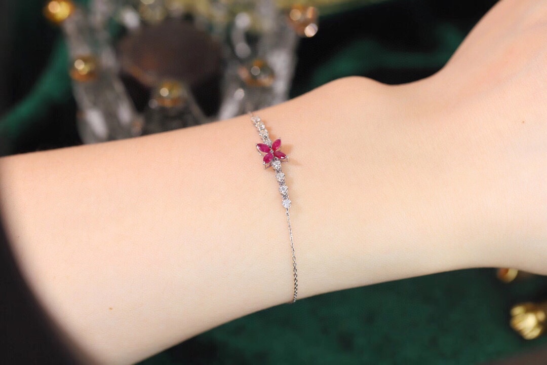 18k Gold Bracelet, Ruby Bracelet with a 0.40ct oval-shaped ruby and a 0.15ct natural diamond