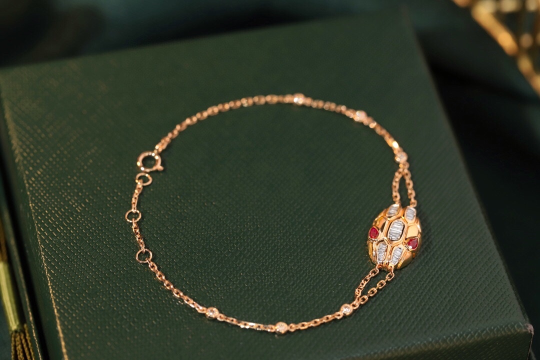 18k Gold Bracelet with Snake Design, Ruby Bracelet featuring a 0.16ct Drop Ruby and a 0.32ct Natural Diamond