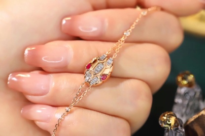 18k Gold Bracelet with Snake Design, Ruby Bracelet featuring a 0.16ct Drop Ruby and a 0.32ct Natural Diamond