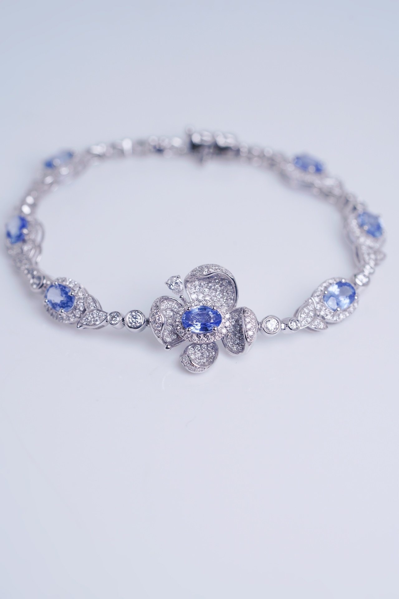 Flowers  18k Gold Bracelet with Luxuriously Set Sapphires and Diamonds totaling 5.70ct