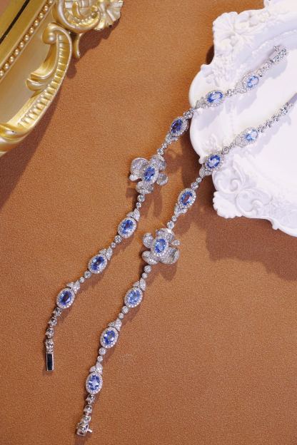 Flowers  18k Gold Bracelet with Luxuriously Set Sapphires and Diamonds totaling 5.70ct