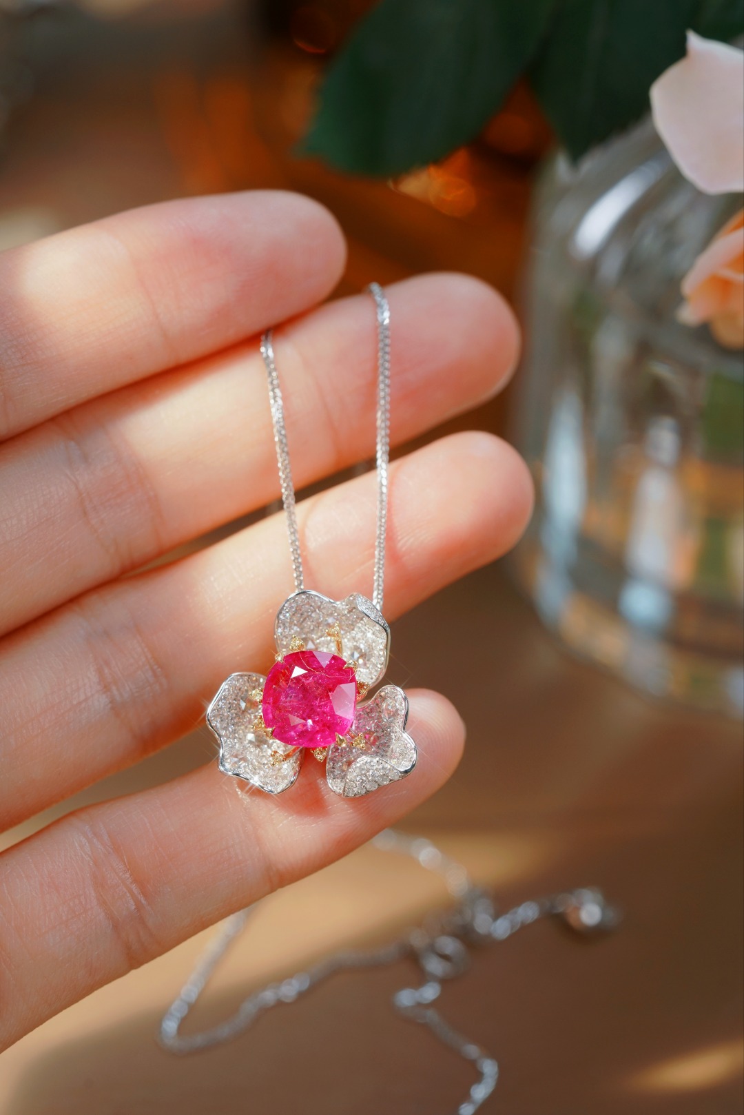 18k gold pendant set with a 3.06ct natural ruby and a 0.95ct natural diamond. Flower-shaped design, adorned with yellow diamonds, featuring a vintage and elegant style.(chain not included)