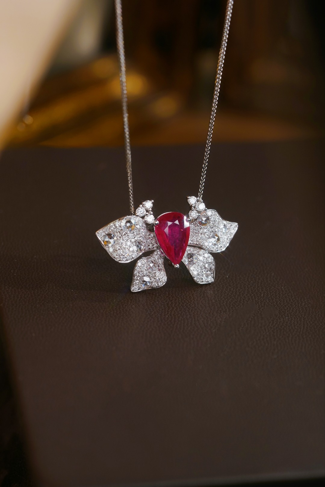 18k gold pendant in butterfly shape, set with 1.84ct natural ruby and 1.10ct natural main stone(chain not included)