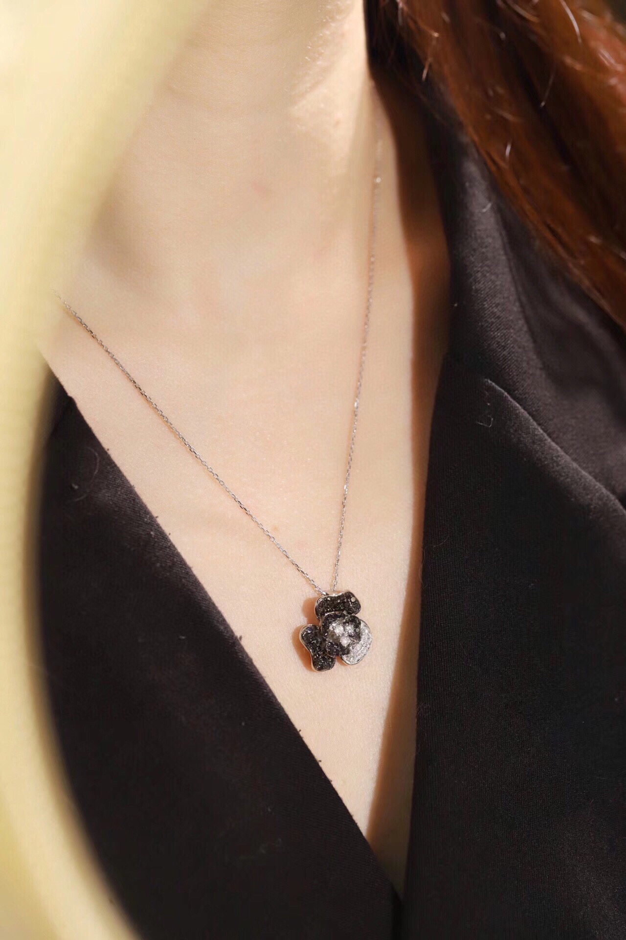 18k Gold Necklace with Flower Design, featuring a combination of black and white diamonds