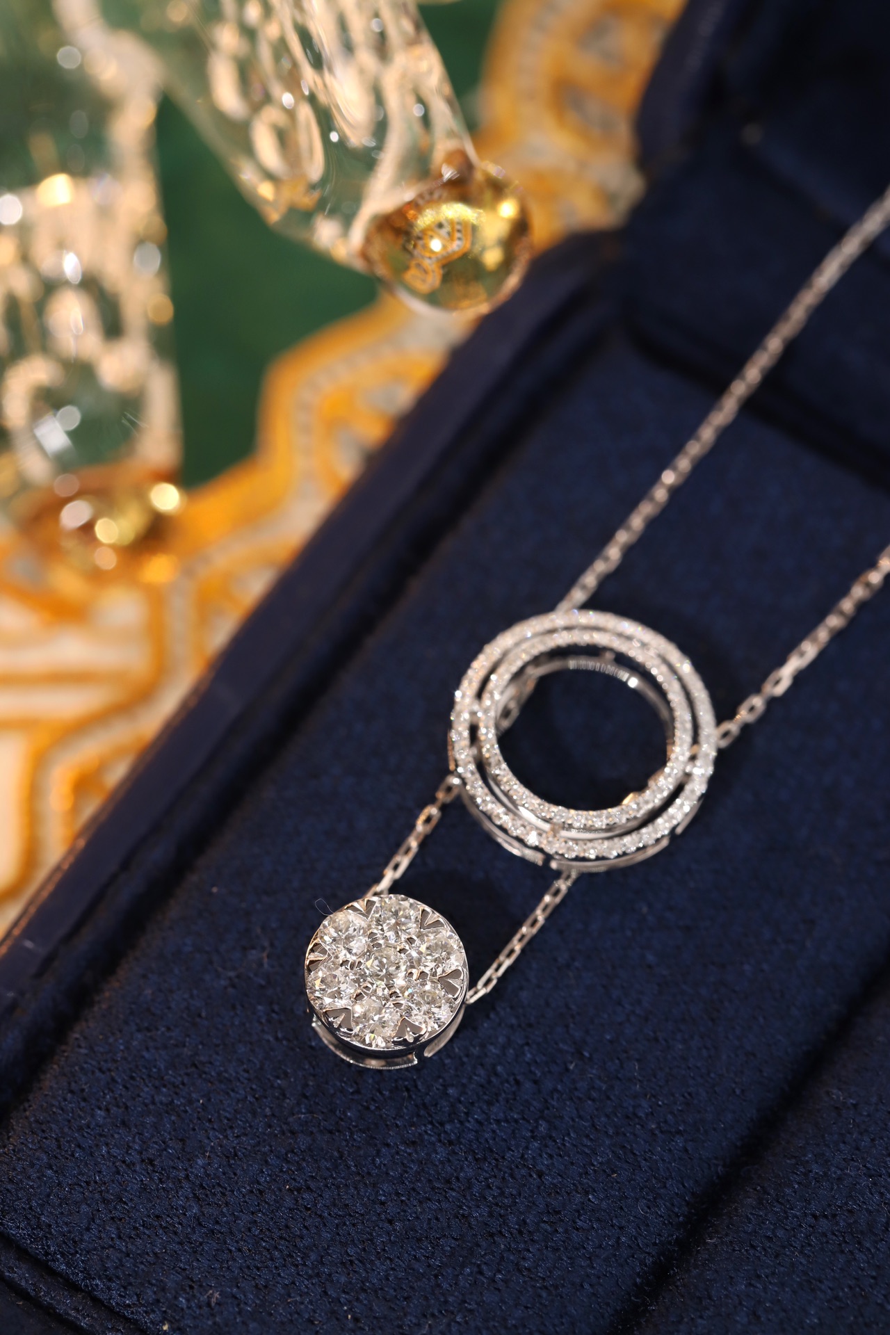 18K gold necklace with a round design; available in three wearing styles; features a 0.50-carat natural diamond setting.