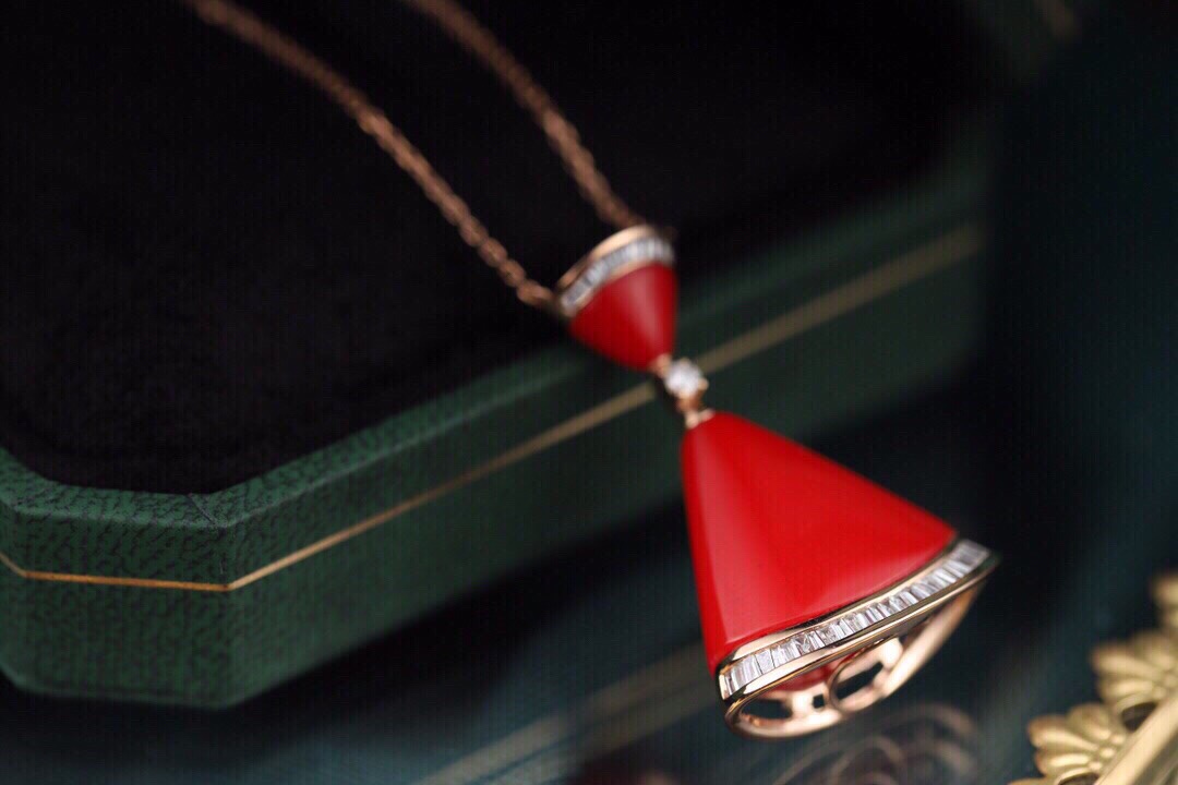 18k gold necklace with mini-dress design; features agate, turquoise, and a 0.30ct natural diamond