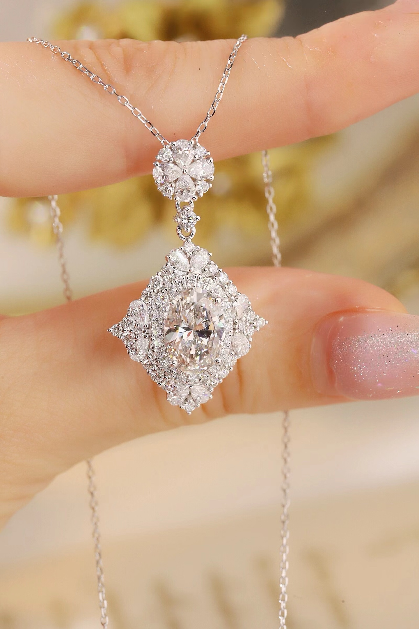 10k gold diamond necklace with a lab-grown diamond of 3.45ct; the main stone is an oval-cut diamond weighing 2.0ct