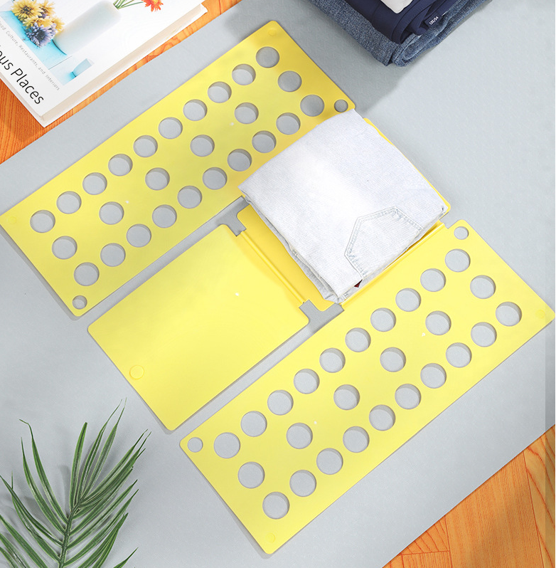 Clothing folding board