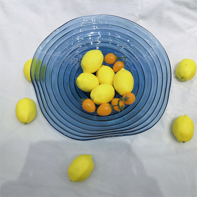 Blue ripple glass fruit bowl, a creative living room fruit bowl, a modern and simple snack and candy dish. Product Details