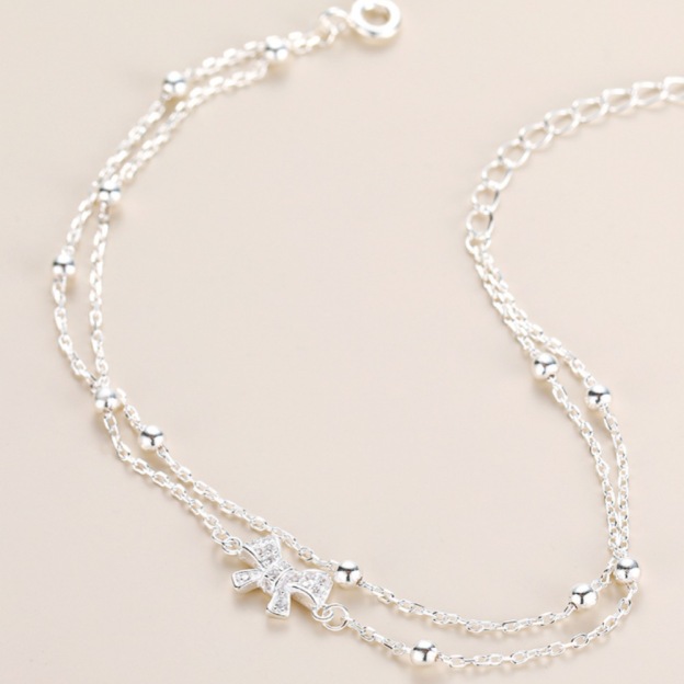 Bow - Accented Silver Bracelet | Double - Layered Whimsy for Your Wrist