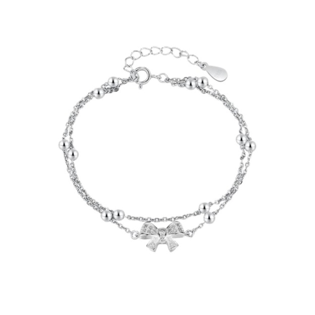 Bow - Accented Silver Bracelet | Double - Layered Whimsy for Your Wrist