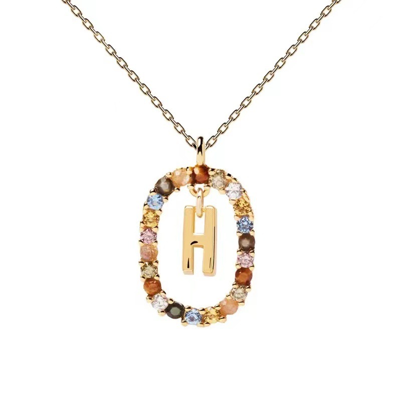 Personalized Gemstone Initial Necklace??A Symbol of Uniqueness
