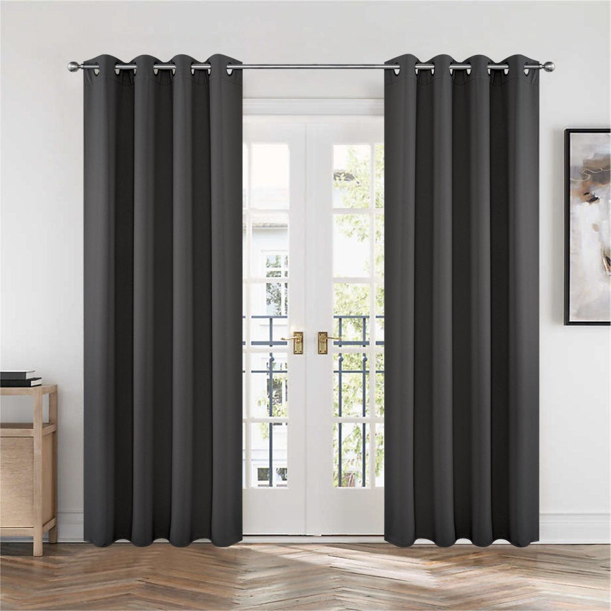 Joydeco dark gray grommet blackout curtains framing French doors, offering thermal insulation for living rooms.