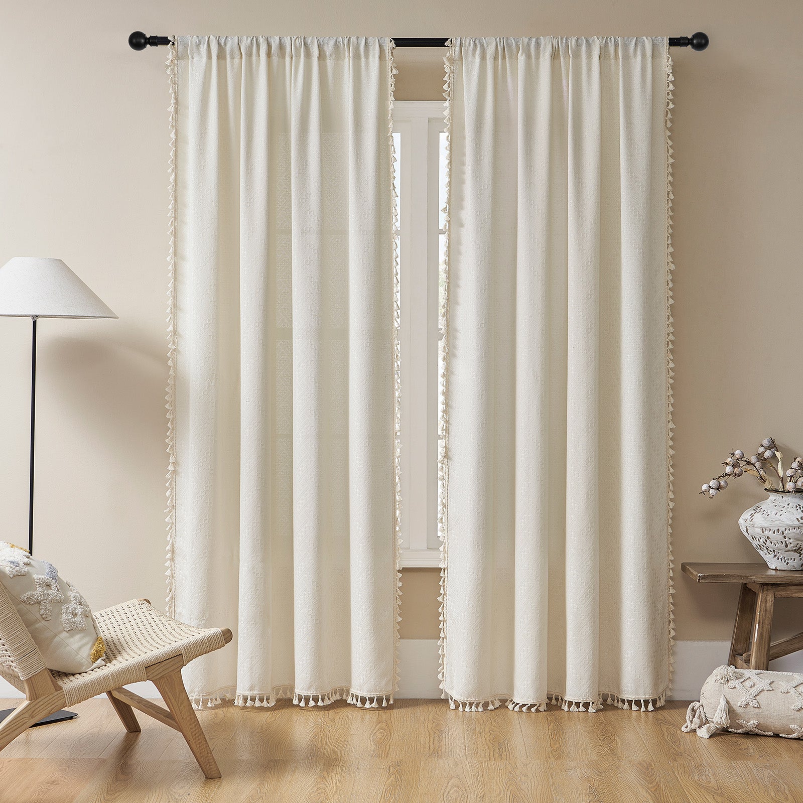 Joydeco beige boho curtains with cream tassel trim, light filtering for living room or bedroom.
