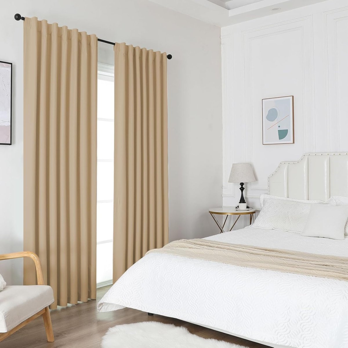 Two dark beige Joydeco blackout curtains with sanded fabric texture, thermal insulated grommet top panels in a bedroom.