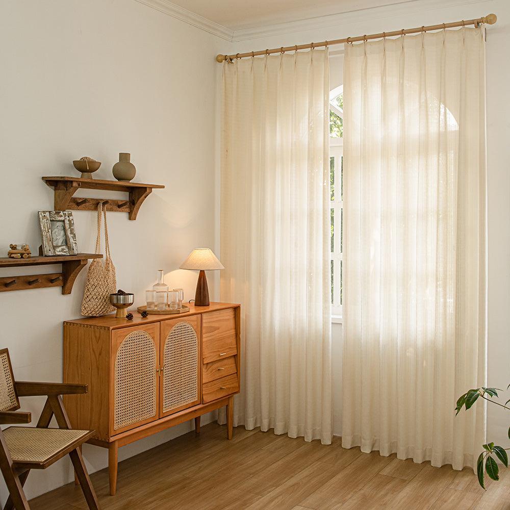 Soft cream dream pleated drapery for elegant insulated interiors
