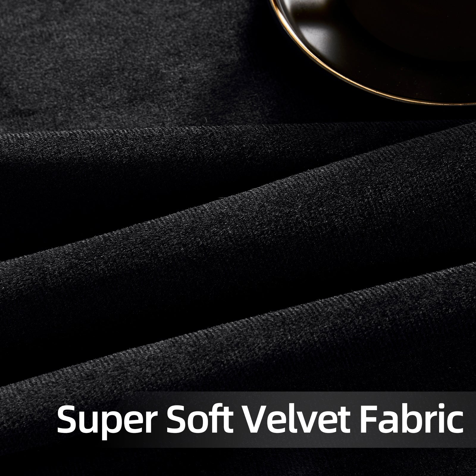 Close-up of draped black velvet fabric showcasing its soft texture and subtle sheen, perfect for luxury curtains.