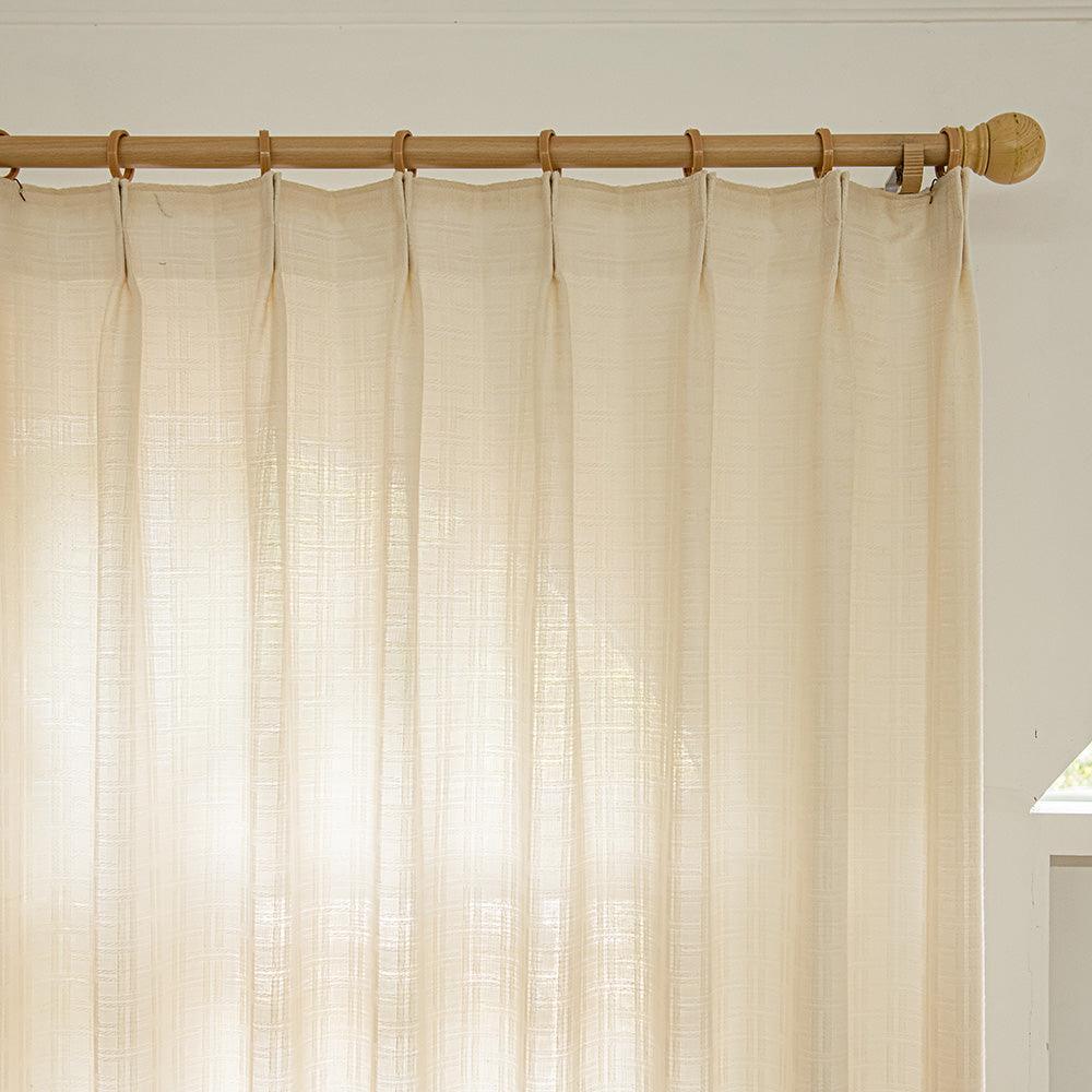Soft cream dream pleated drapery for elegant insulated interiors
