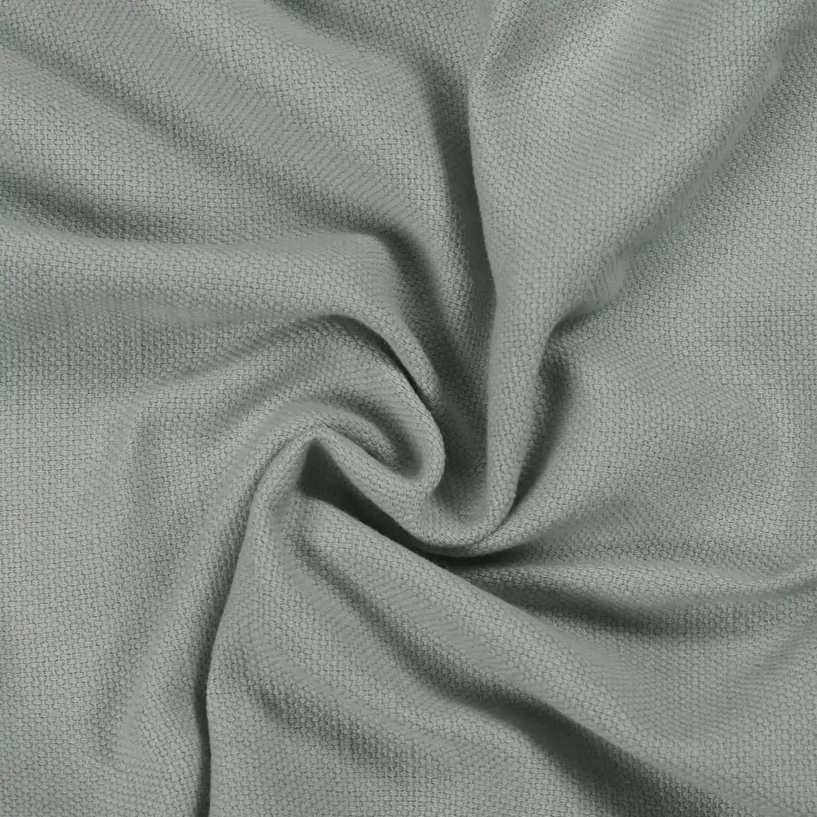 Broad 100 percent cotton plain weave pleated drapery for elegant insulated interiors