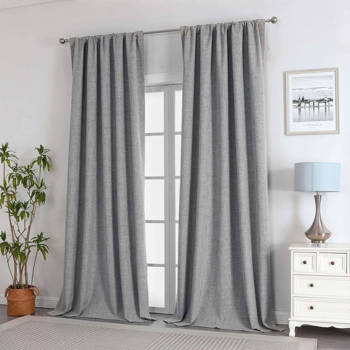 Joydeco light grey linen blackout curtains in a room setting.