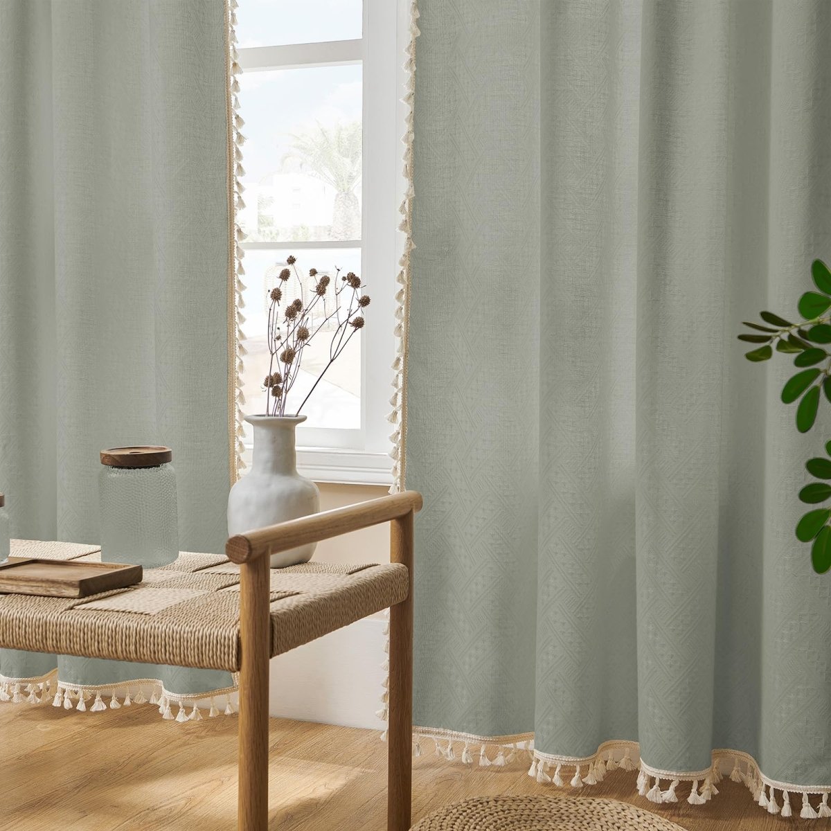 Boho grayish-green linen sheer curtains with geometric pattern and cream tassel trim, farmhouse style.