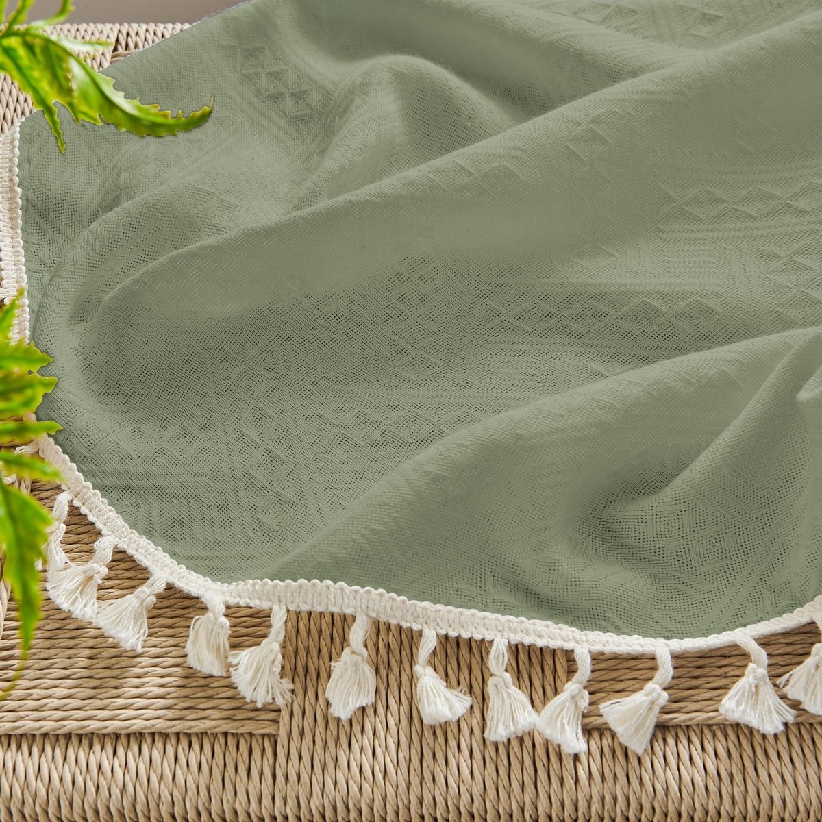 Boho sage green linen sheer curtain fabric with diamond weave and cream tassels.