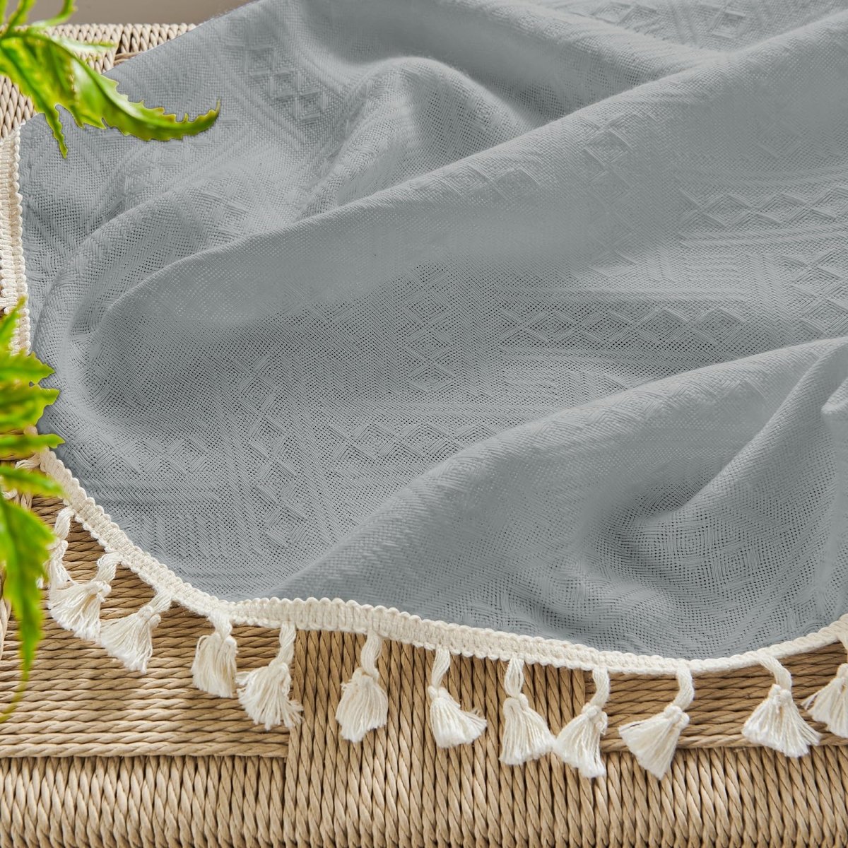 Joydeco Stone Blue linen sheer curtain fabric detail with woven geometric pattern and cream tassel trim, farmhouse style.