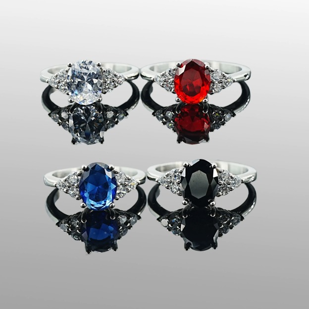 Classic Oval-Cut Colored Gemstone Ring | Elegant Three-Stone Design