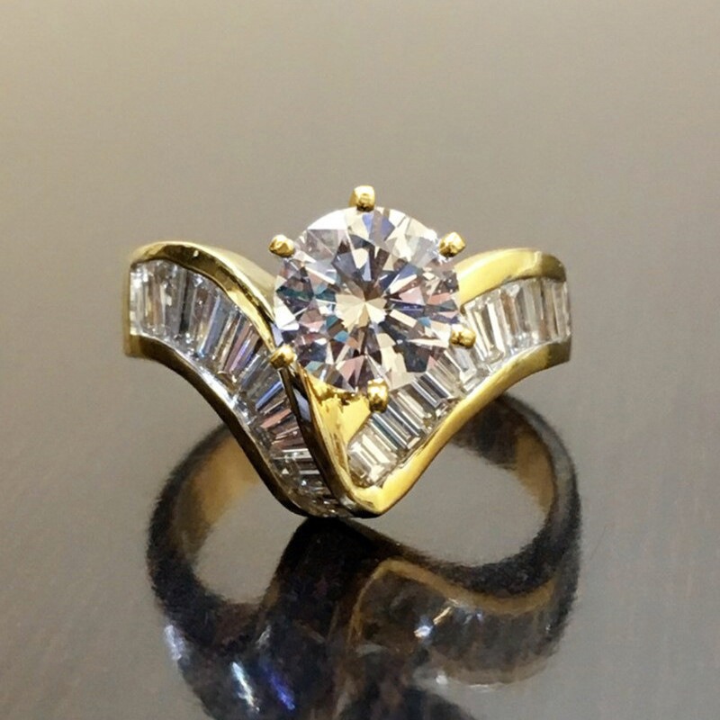 Two-Tone Starburst 18K Gold Six-Prong Center Baguette Ring