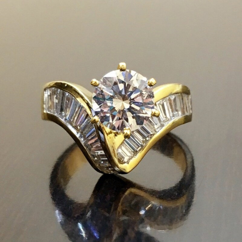 Two-Tone Starburst 18K Gold Six-Prong Center Baguette Ring