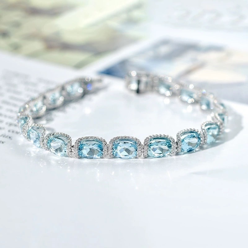 Ocean Blue Elegance 18K White Gold Aquamarine Halo Diamond Bracelet