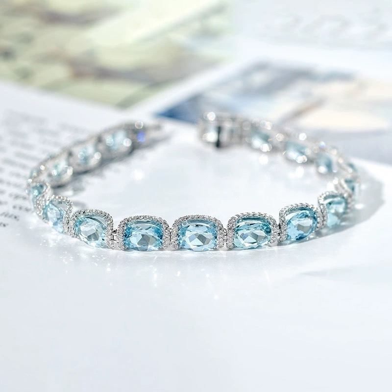 Ocean Blue Elegance 18K White Gold Aquamarine Halo Diamond Bracelet