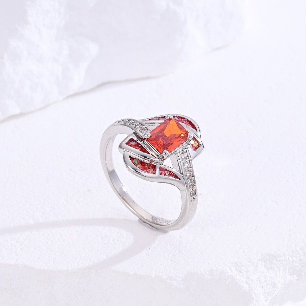 Sterling Silver Princess Cut Red Stone Twisted Ring