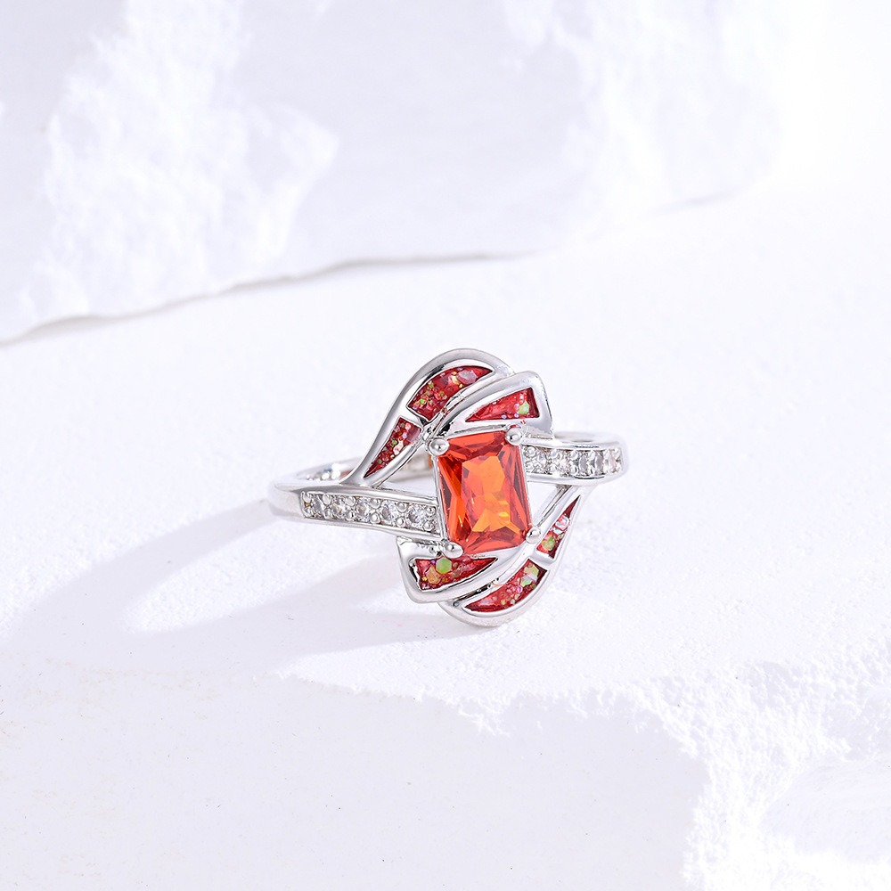 Sterling Silver Princess Cut Red Stone Twisted Ring