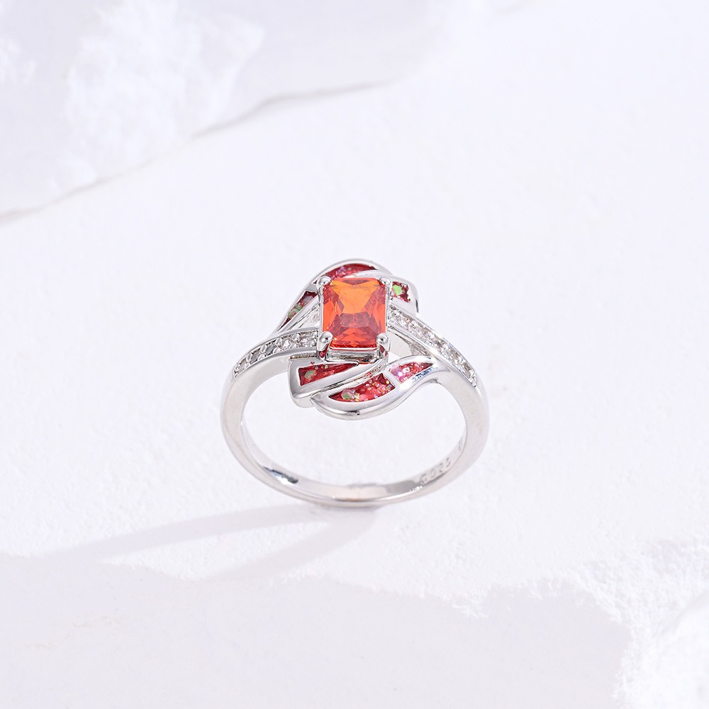 Sterling Silver Princess Cut Red Stone Twisted Ring