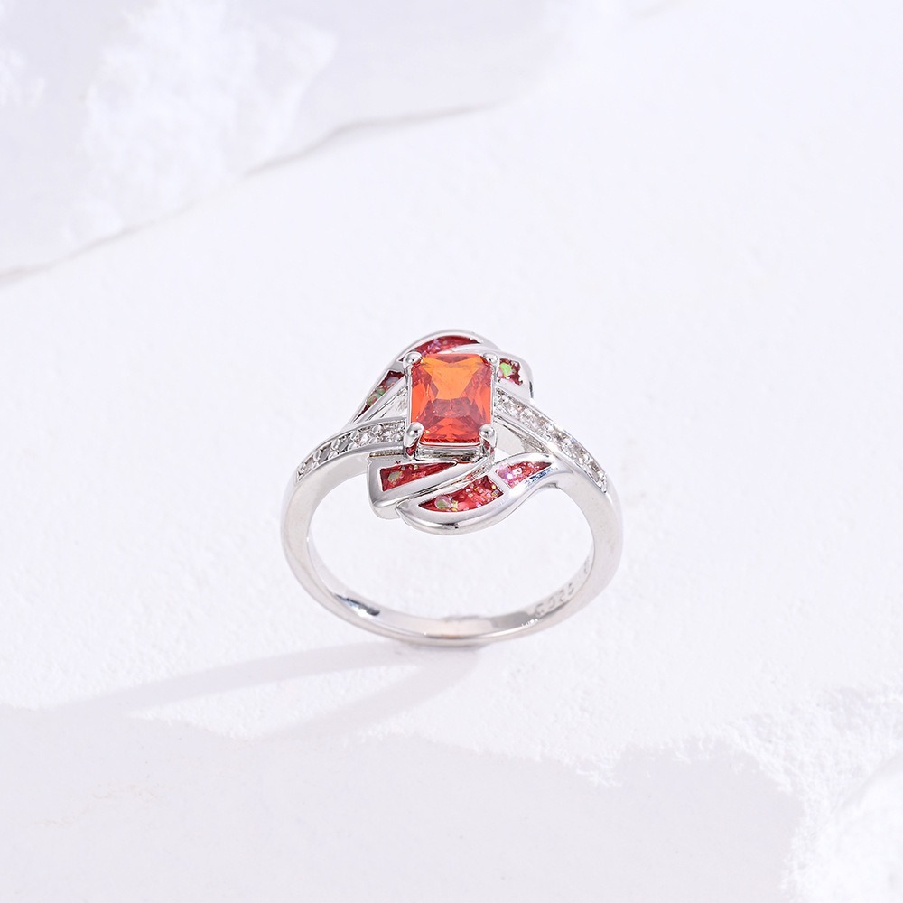 Sterling Silver Princess Cut Red Stone Twisted Ring