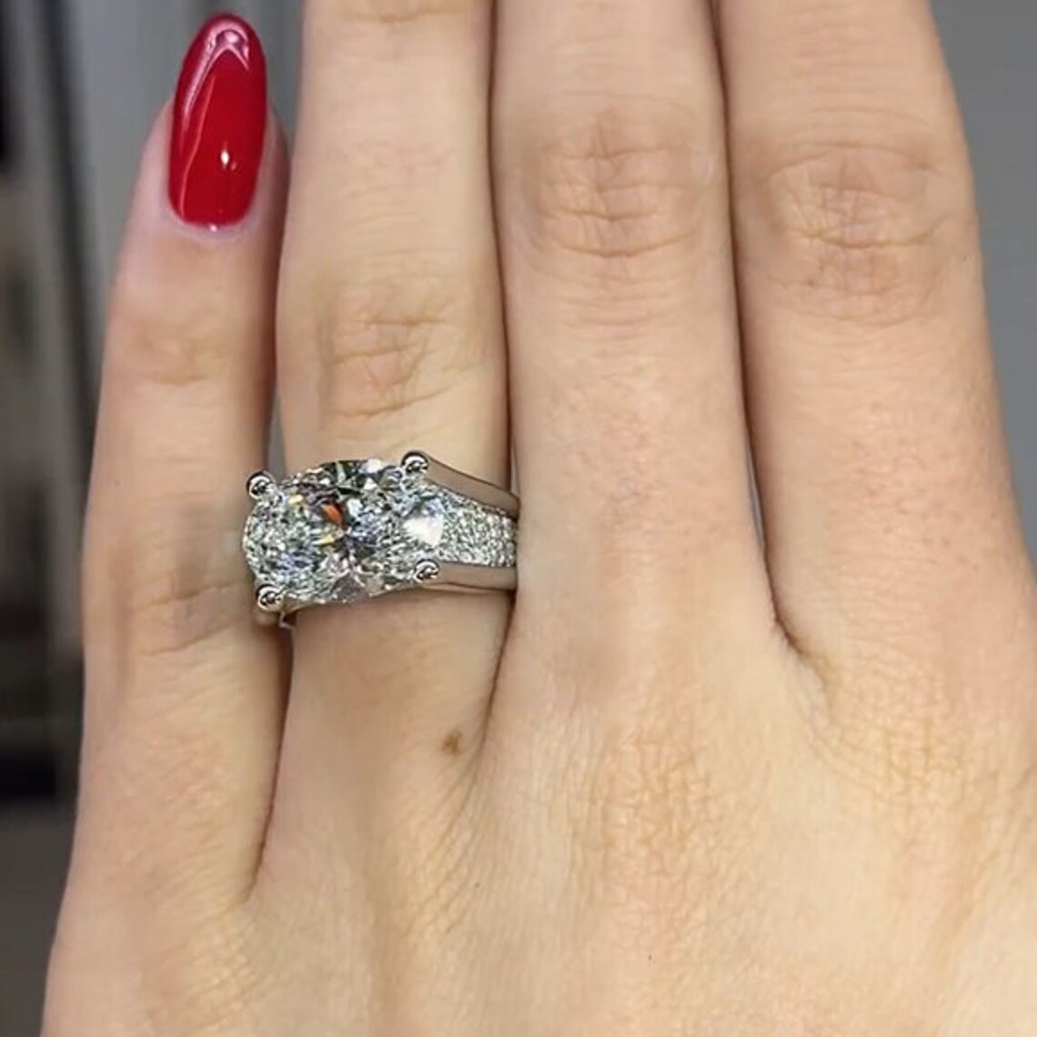 Oval Brilliance Platinum Four-Prong Oval Diamond Ring