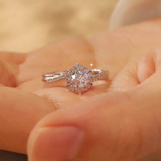 Twisted Band Solitaire Ring in Platinum Tone