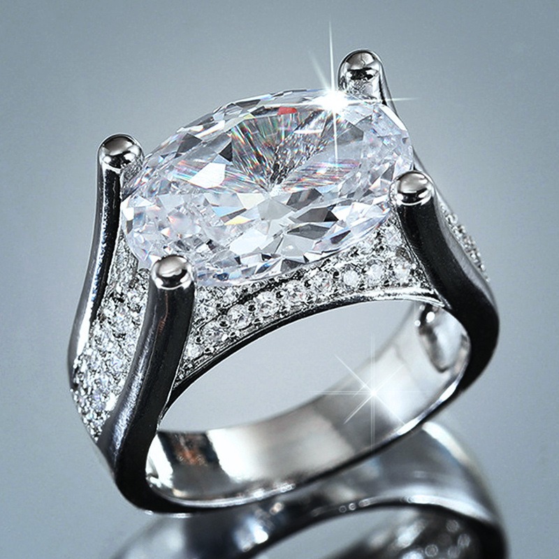 Oval Brilliance Platinum Four-Prong Oval Diamond Ring