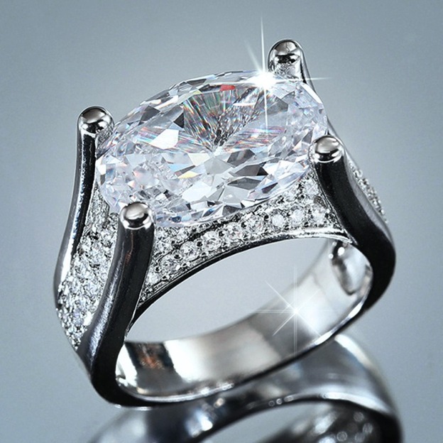 Oval Brilliance Platinum Four-Prong Oval Diamond Ring