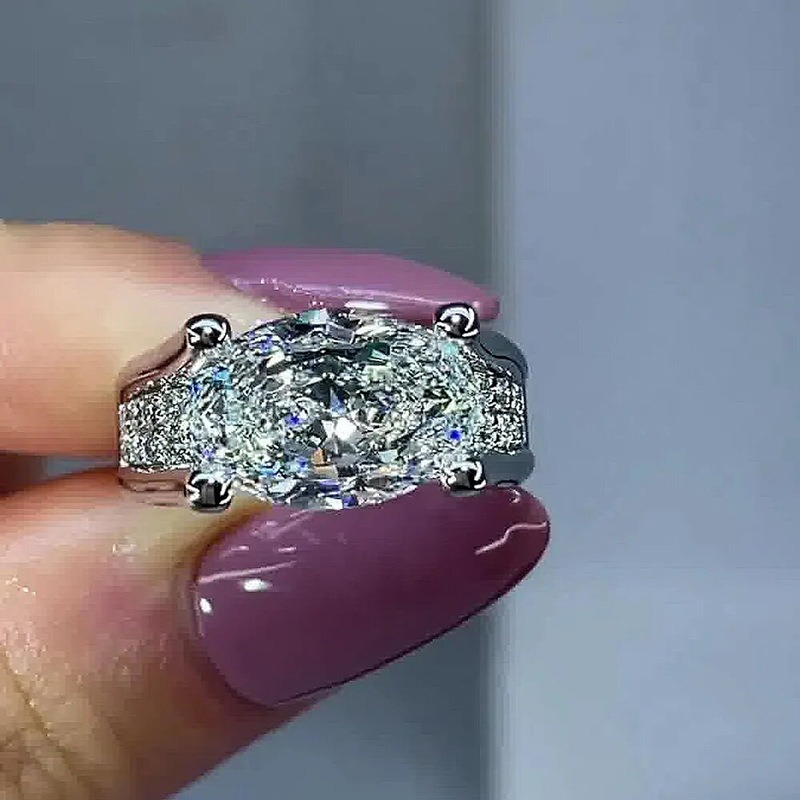 Oval Brilliance Platinum Four-Prong Oval Diamond Ring