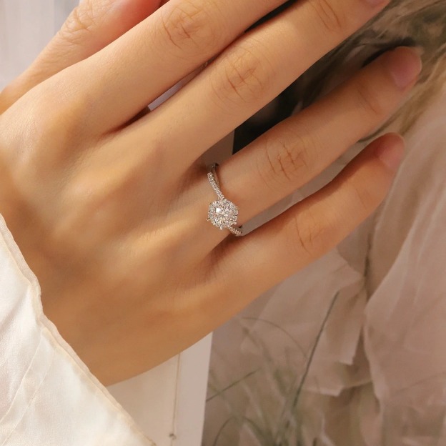 Twisted Band Solitaire Ring in Platinum Tone