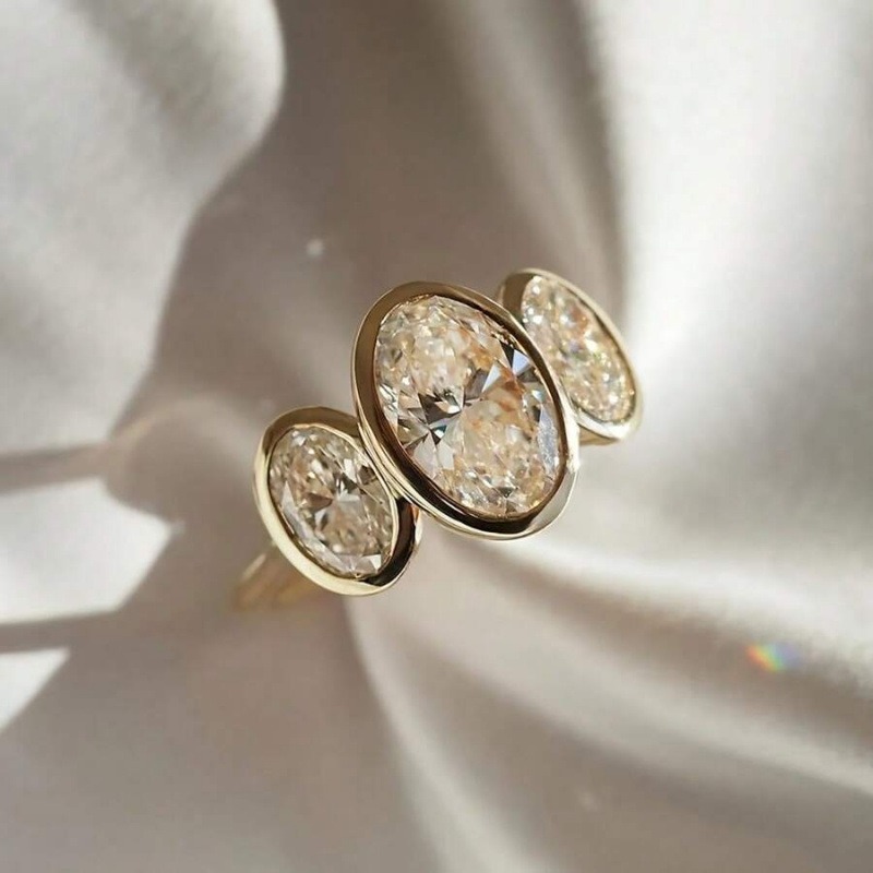 Gilded Circle Harmony 18K Gold Bezel-Set Three-Stone Ring